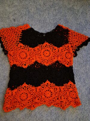 Orange and black crochet top by Triggerfish Crochet