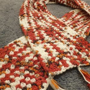 Red and white crochet scarf by Triggerfish Crochet 