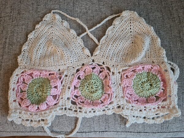 Cream, pink and green crochet halter top with granny squares. Triggerfish Crochet