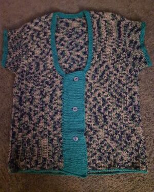 Blue green half sleeved crochet front open sweater with turquoise trimming by Triggerfish Crochet.