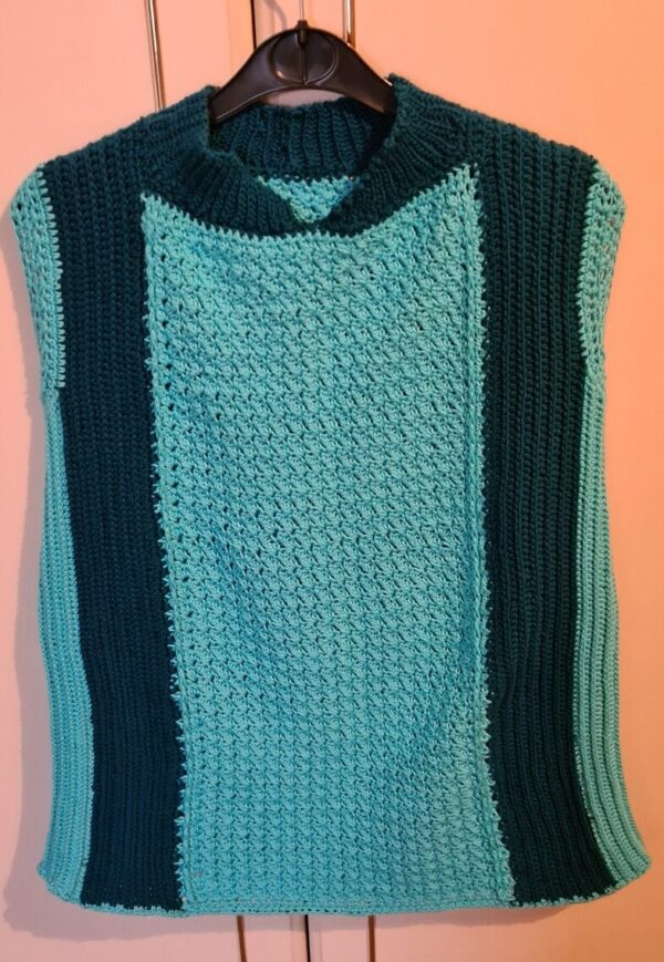 Turquoise crochet shirt using cotton yarn with indigo blue stripes on the sides by Triggerfish Crochet