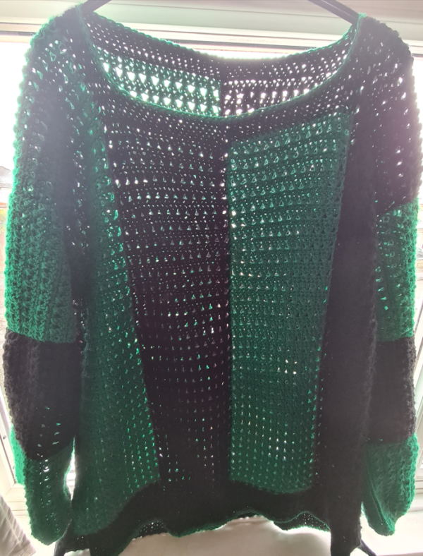 Green and black crochet sweater with thick stripes. Triggerfish Crochet