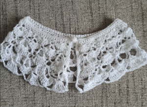 White crochet lace collar made with thin cotton yarn