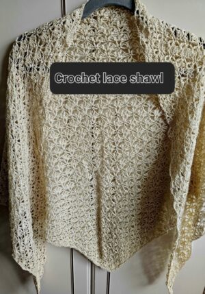 Crochet Lace Shawl in Cream colour on a hangerby Triggerfishcrochet